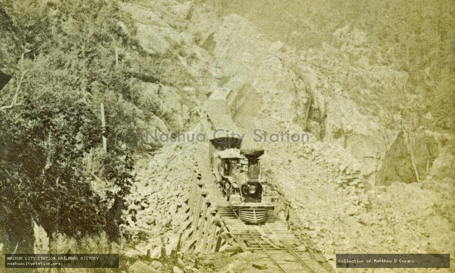 Stereoview: Pass of the Crawford Notch and Portland & Ogdensburg Railroad Train
